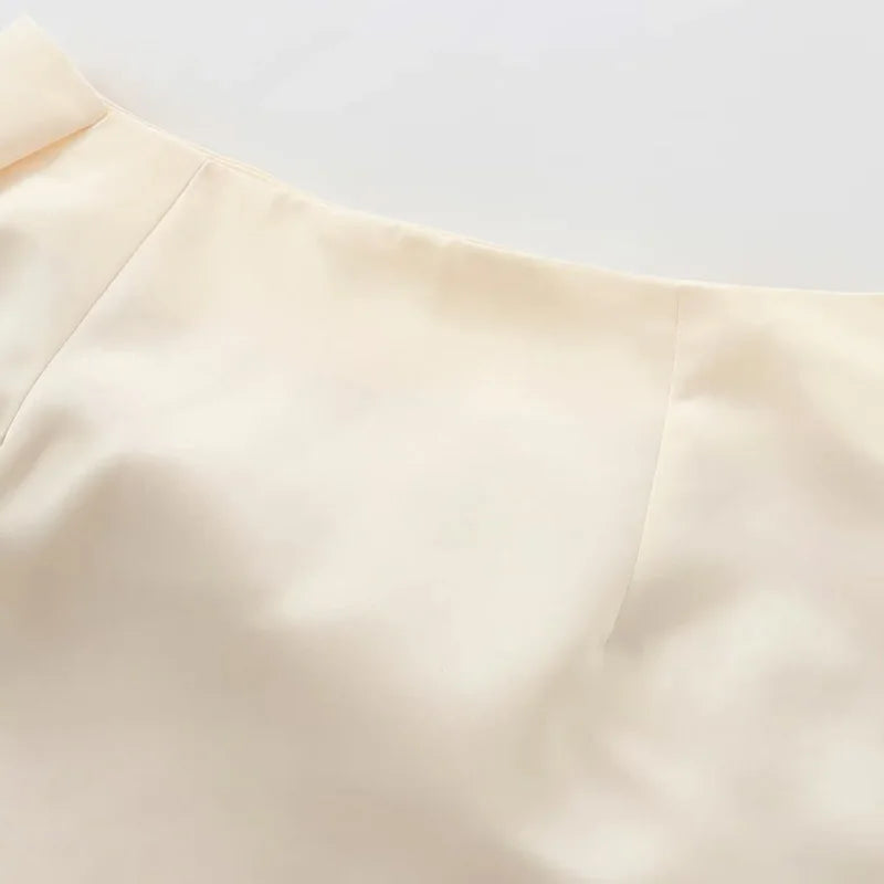 SATIN BOW PLEATED MINI SKIRT