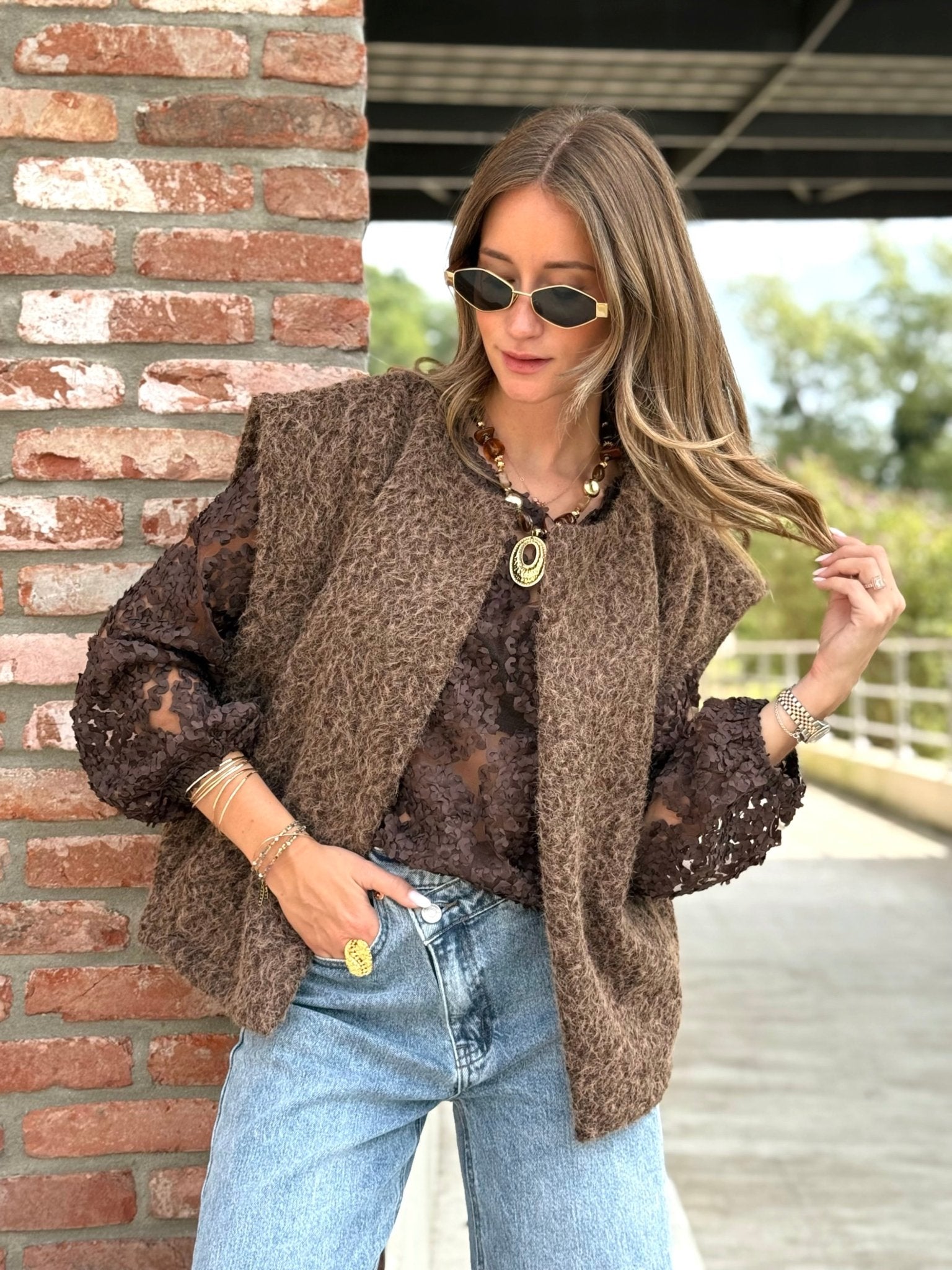 Le gilet sans manche clara marron