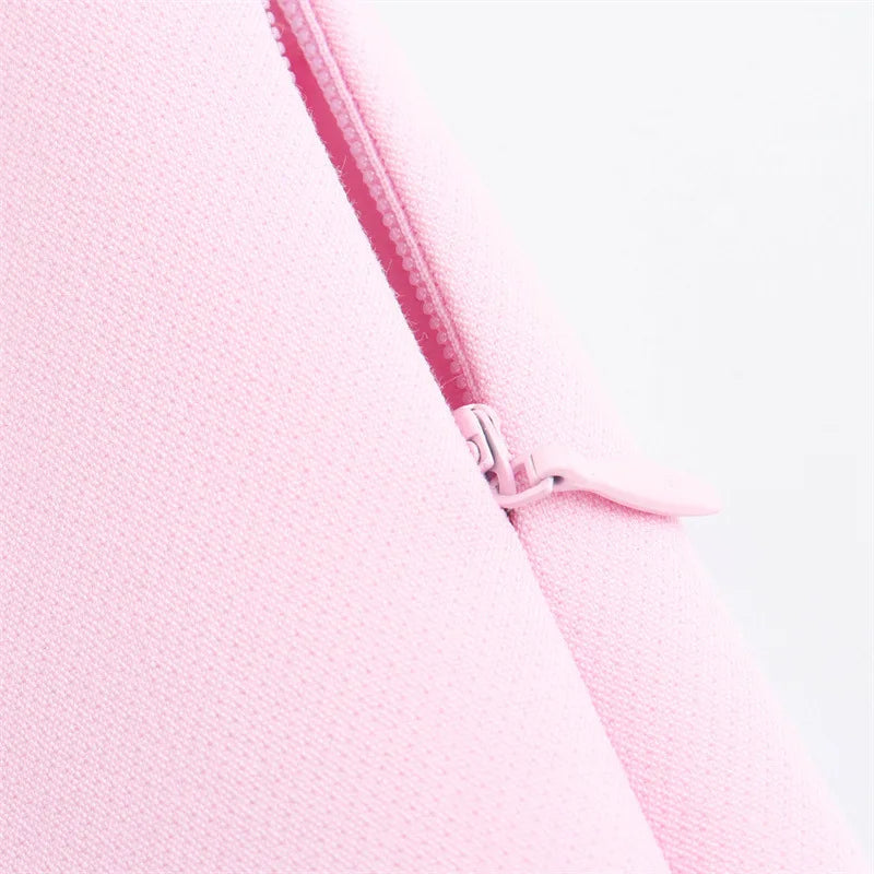 ASYMMETRIC CYBER PINK LOW-RISE SKIRT WITH BRALETTE