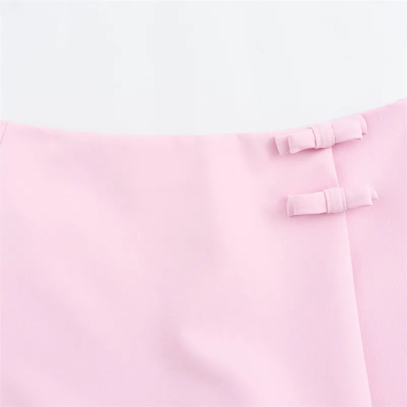 ASYMMETRIC CYBER PINK LOW-RISE SKIRT WITH BRALETTE