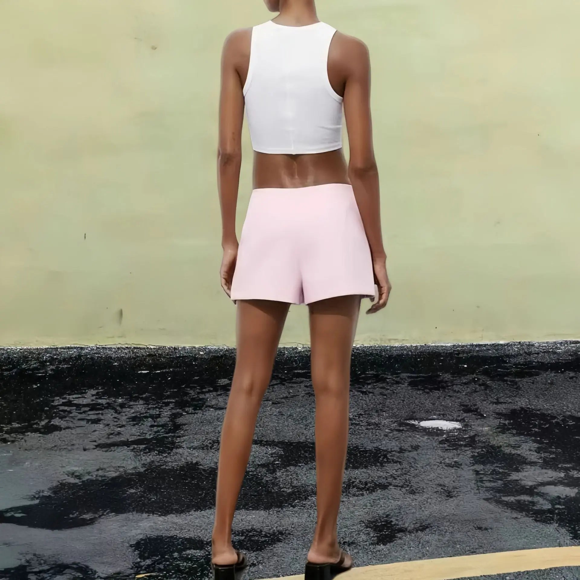 ASYMMETRIC CYBER PINK LOW-RISE SKIRT WITH BRALETTE