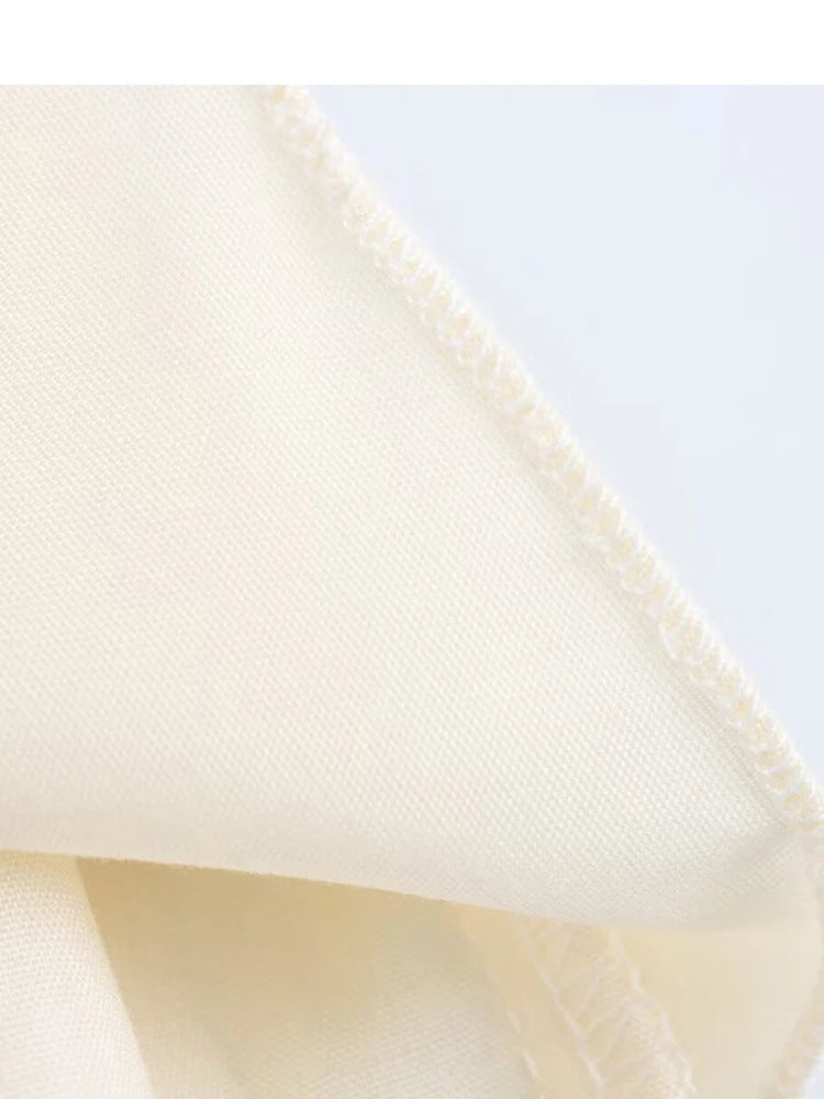 CHIC RUFFLED MINI SKIRT – PEARL EMBELLISHED